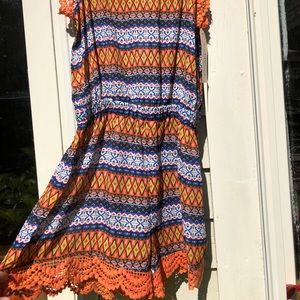 Orange and blue patterned romper